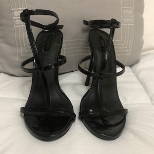 Black strappy heels, size 7.5